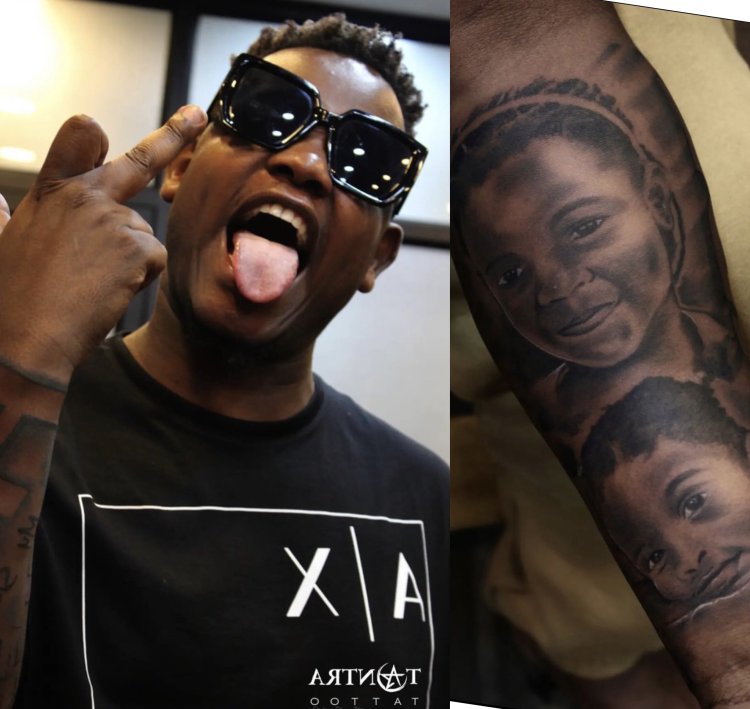 Bruce Melodie yishyizeho tatuwaje [tattoo] z’abana be