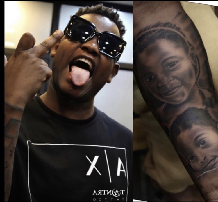 Tattoo imwe ayihuje n’umugore ndetse isobanuye uko bahuye! Bruce Melodie yiniguye uko yabaye mu buroko