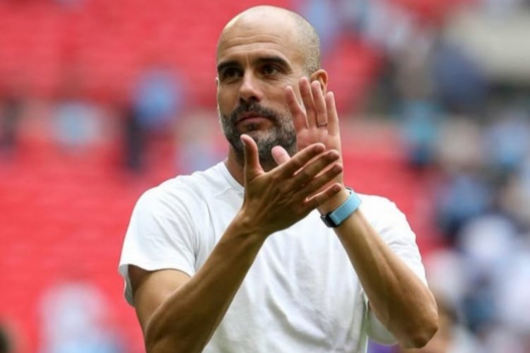 Pep Guardiola yahagaritswe imikino ibiri
